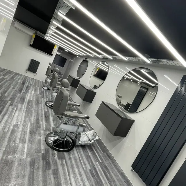 The chairs and mirrors at Fredo's Barbershop